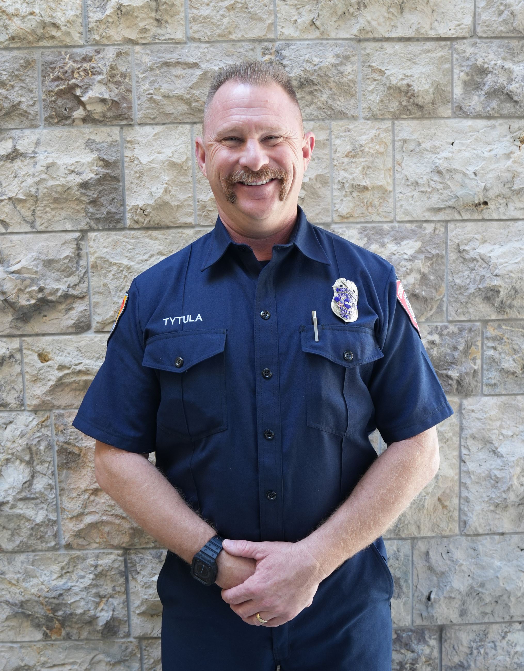 Engineer Jeff Tytula stands in front of a wall
