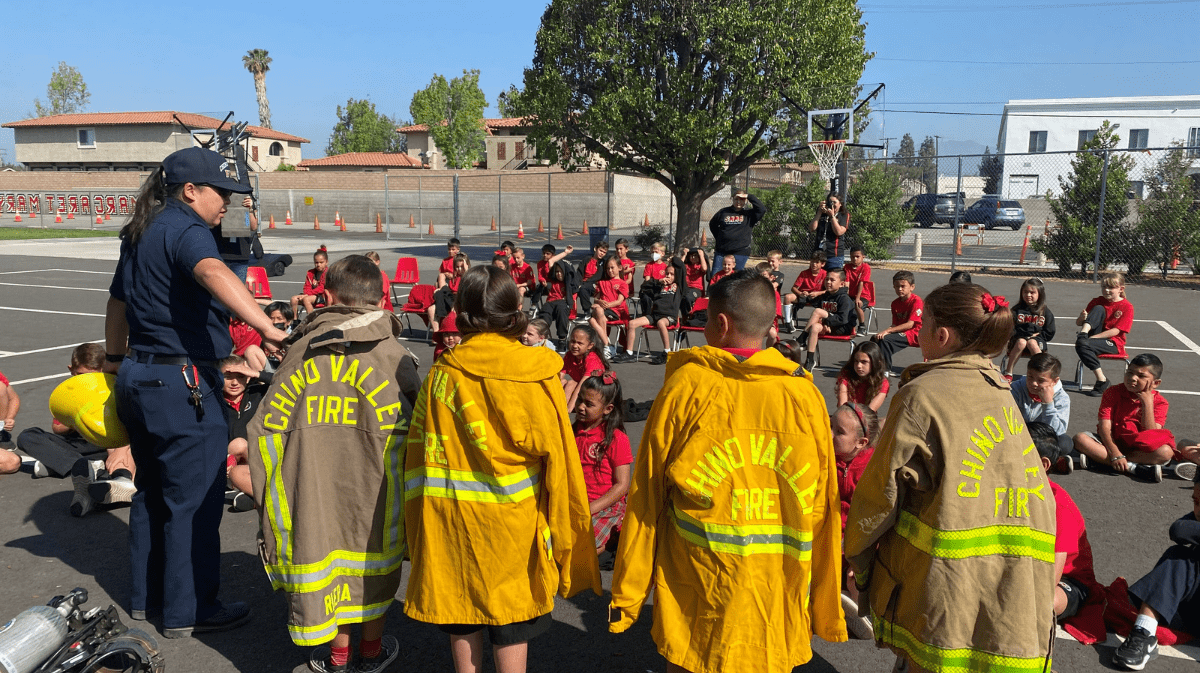 Chino Valley Firefighters conducting fire safety training for students